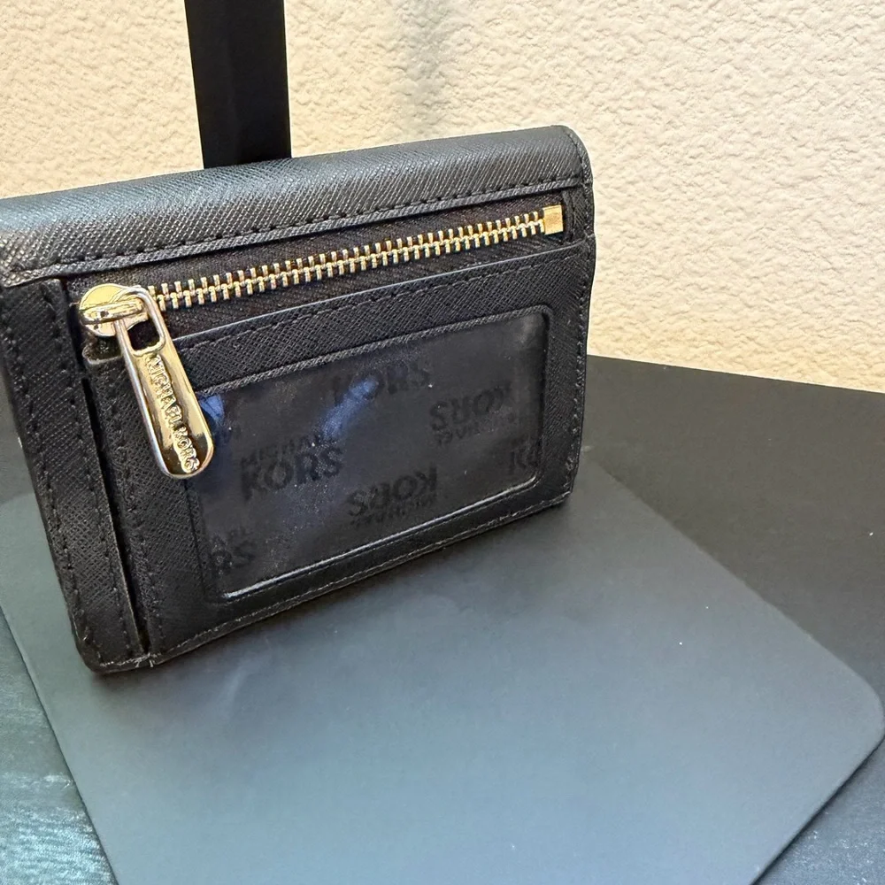 Michael Kors Black trifold wallet with Gold Logo